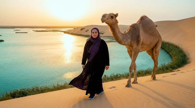 Saudi Woman with Camel at Desert Oasis Sunset