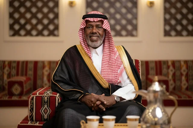 Senior Saudi Man in Traditional Majlis Wearing Bisht