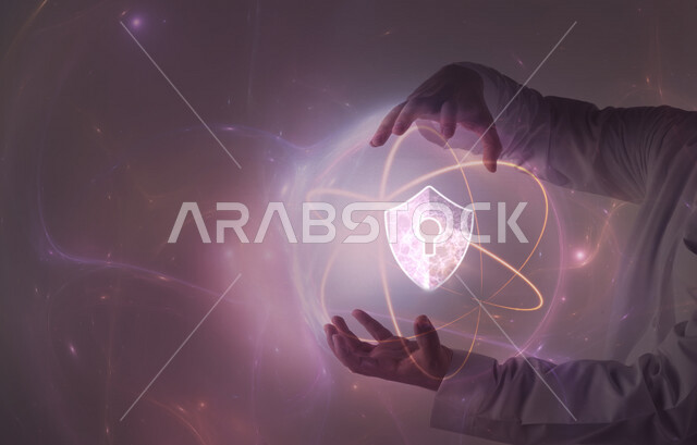 صورة مقربة ليد رجل عربي خليجي سعودي يحمل بين يديه شبكة حلقية متداخلة بها أيقونة مضيئة خاصة بأمان شبكات الانترنت و الحاسوب بتقنية الهولوجرام ثلاثية الأبعاد ، حماية الحاسوب و أمن تكنولوجيا المعلومات 