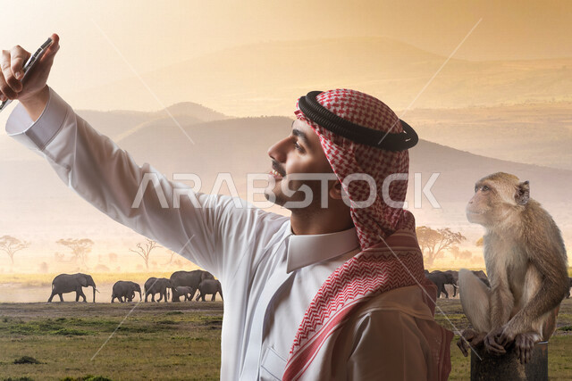 A picture of a Saudi Arabian Gulf tourist taking a souvenir photo through a mobile phone in the Riyadh safari, front camera, exploring wildlife, Riyadh season activities, a trip to nature reserves, recreational tourist activities, spending enjoyable times