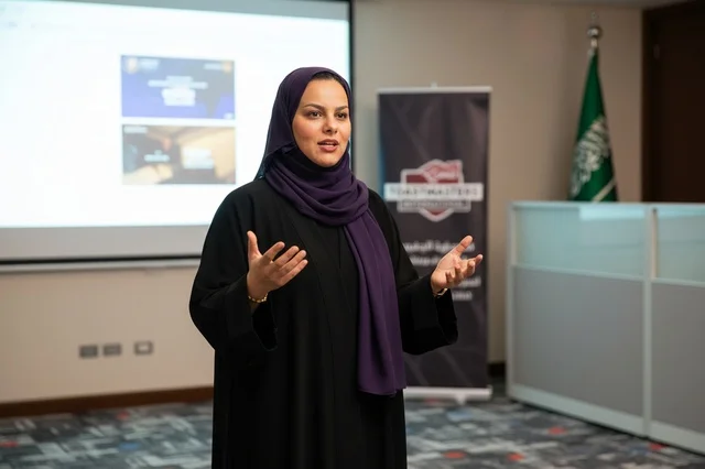 Saudi Businesswoman Presenting in Abaya and Hijab
