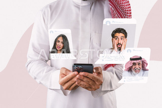 صورة مقربة لرجل عربي خليجي سعودي يقوم بإستخدام هاتفه المحمول ,  تصفح مواقع التواصل الإجتماعي , الدردشة والتواصل , نوافذ منبثقة , منشورات التواصل الإجتماعي , المشاركة والإعجابات على وسائل التواصل الإجتماعي .