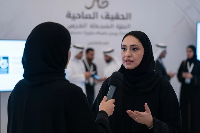 Emirati Woman Abaya Media Interview Corporate Event