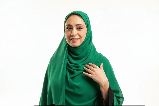 Saudi Woman in Green Hijab and Black Abaya