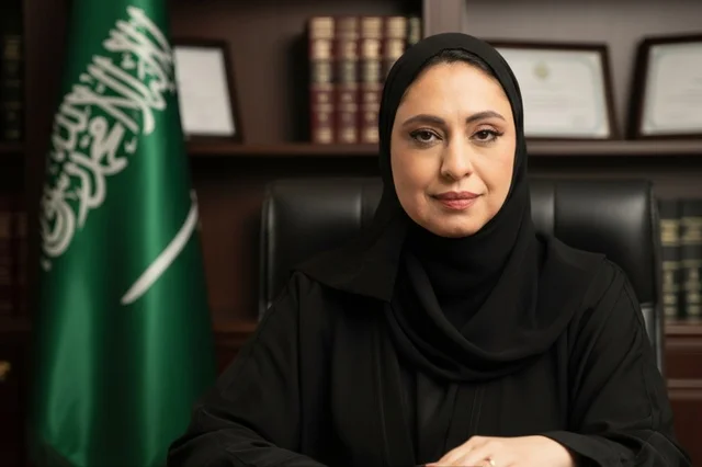 Professional Saudi Woman in Abaya with National Flag