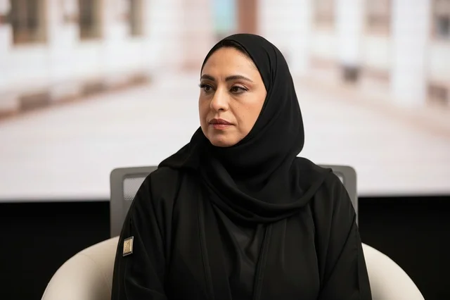 Emirati Businesswoman in Black Abaya and Hijab