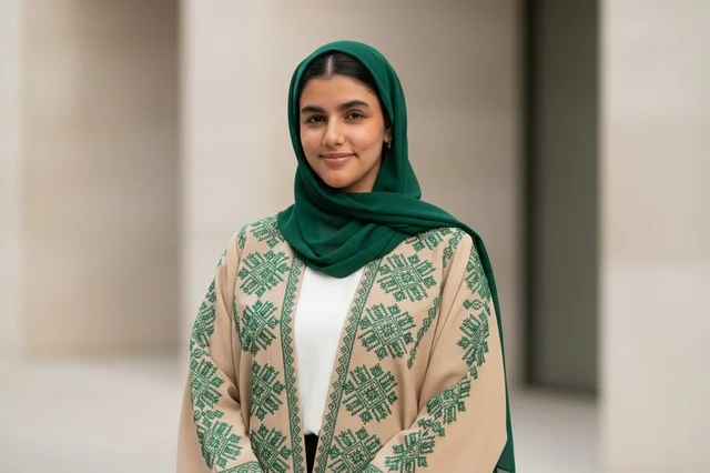 Saudi Woman in Traditional Green Hijab and Bisht