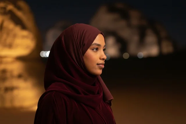 Saudi Woman in Maroon Hijab at AlUla Night