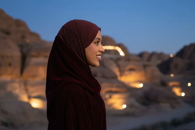 Jordanian Woman in Hijab at Petra Mountains Night