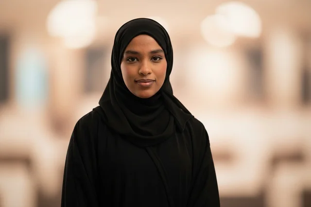 Saudi Woman in Black Abaya and Hijab Office Portrait