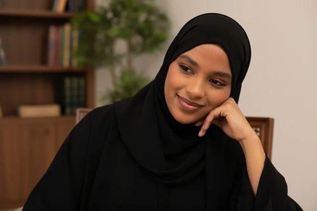 African Arab Woman in Black Abaya and Hijab