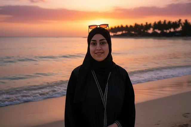 Arab Woman in Black Abaya on Beach at Sunset
