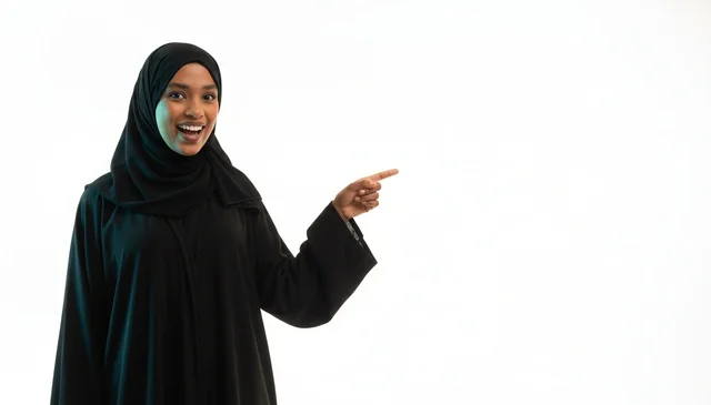 Emirati Woman in Abaya Pointing at White Background
