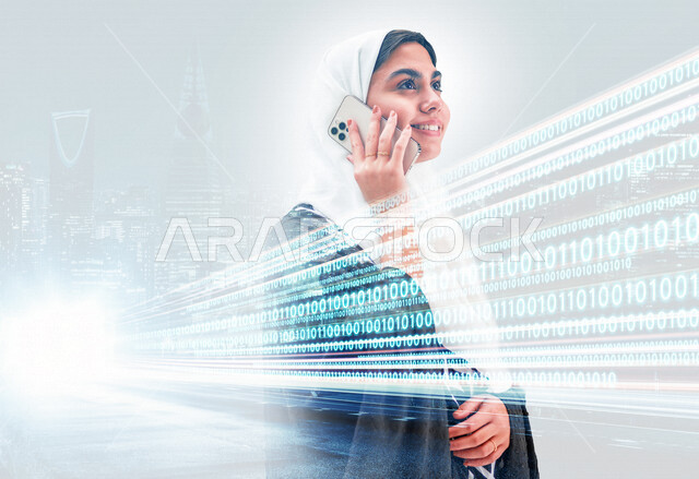 سيدة عربية خليجية سعودية تقوم باجراء مكالمة من خلال الهاتف المحمول مع خلفية تحتوي على بيانات رقمية وابراج السعودية ، مواكبة الحداثة و التطور التكنولوجي، تطوير الويب ، تطوير وبناء المواقع والتطبيقات الالكترونية، اكواد وخوارزميات، تقنيات وحاسوب