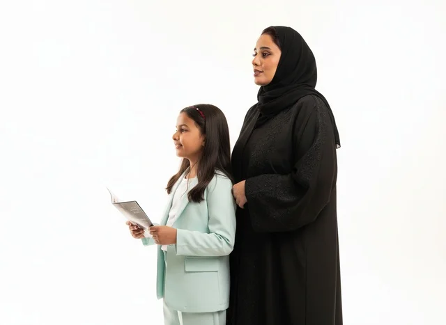 Emirati Mother and Daughter in Formal Attire Studio