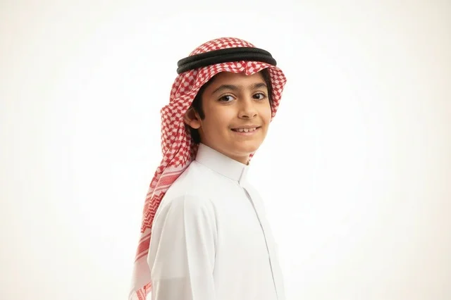 Saudi Boy in Traditional National Thobe and Ghutra