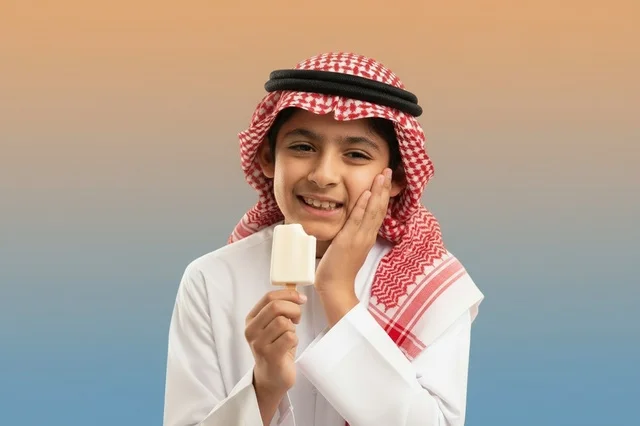Saudi Boy in Traditional Thobe with Toothache Pain