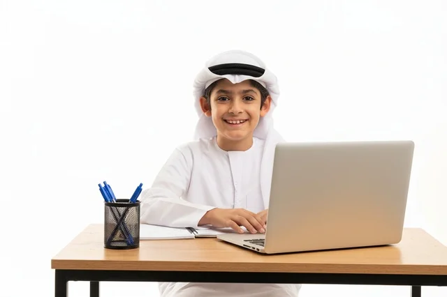 Emirati Boy with Laptop on White Background