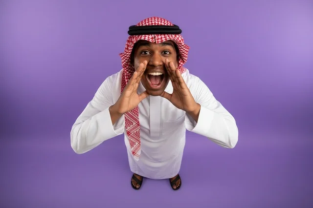Saudi Man in Traditional Thobe Shouting on Purple Background