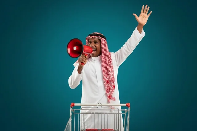 Saudi Man with Megaphone and Shopping Cart