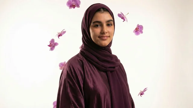 A Saudi woman in a hijab with glowing light trails.