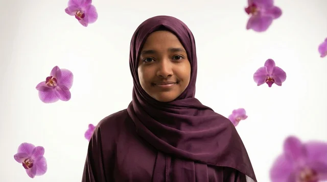 Saudi Woman in Purple Hijab with Floating Orchids