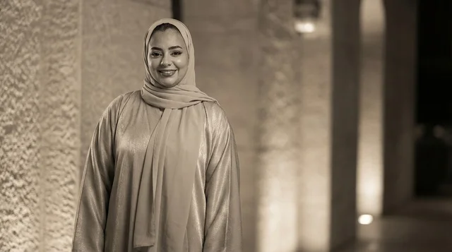 Emirati Woman in Traditional Abaya Sepia Portrait