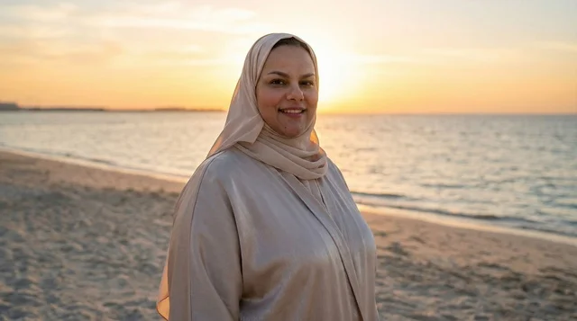 Saudi Woman in Abaya on Beach at Sunset