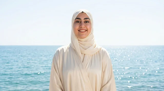 Saudi Woman in Hijab Standing at the Beach