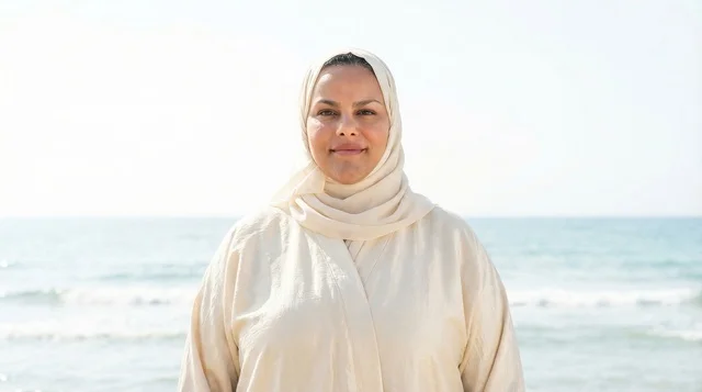 Emirati Woman in Hijab and Abaya at the Beach