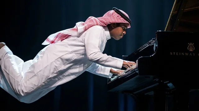 Saudi Boy Playing Grand Piano While Levitating