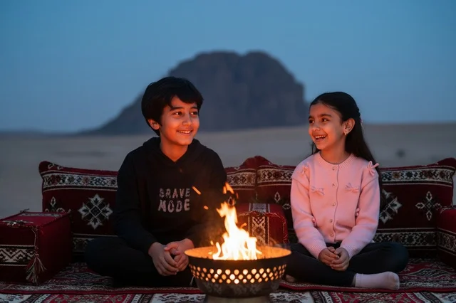 Saudi Kids Desert Camping at Twilight by Campfire