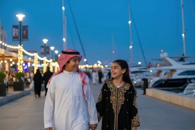 Saudi Children Walking at Marina Waterfront at Night