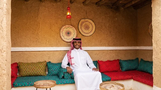 Saudi Man in Traditional Heritage Mud House Majlis