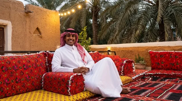 Saudi Man in Traditional Thobe at Heritage Majlis Saudi Man in Traditional Thobe at Heritage Majlis
