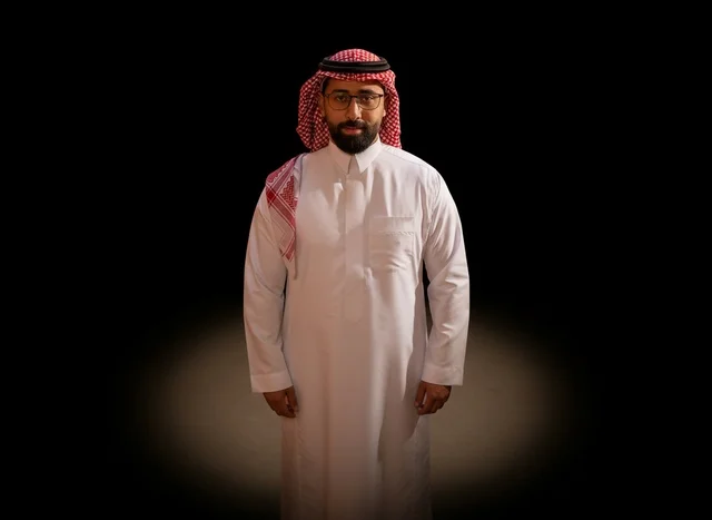 Saudi Man in Traditional Thobe and Shemagh