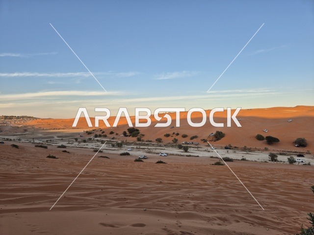 روضة الخرارة الكثبان الرملية في صحراء السعودية وقت الغروب