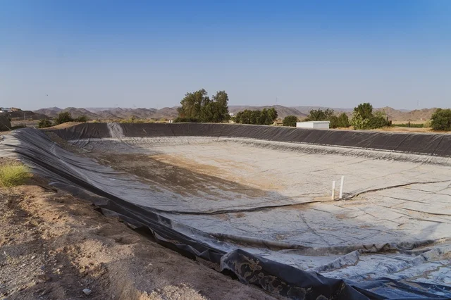 Empty Agricultural Water Reservoir with Plastic Liner