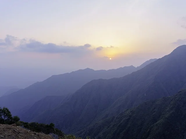 Misty Mountain Peaks Range at Sunset Landscape View