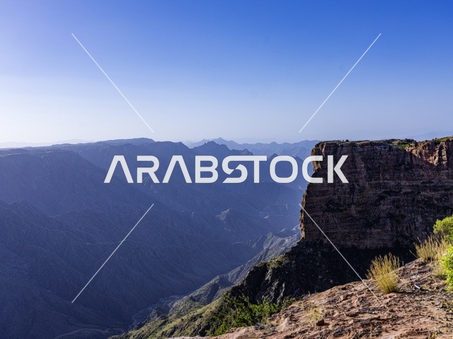 Rugged Mountain Cliffs and Valley View in Daylight