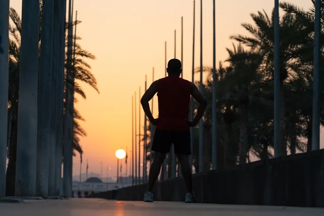 Athletic Man Silhouette at Sunset Outdoor Fitness Workout