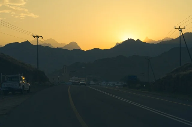 Mountain Highway Road at Golden Hour Sunset Silhouette