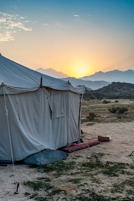 Traditional Desert Tent Camping at Mountain Sunset