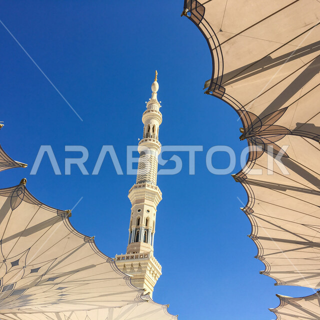 A close to an electronic umbrella and the museum of the Prophet in Madinah in Madinah in Saudi Arabia, the Prophet's Mosque, the landmarks of the Prophet's Mosque in the Prophet's Mosque in Madinah, worship and closer to God, Hajj and Umrah season