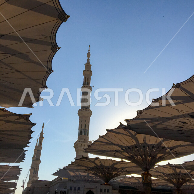 A close to an electronic umbrella and the museum of the Prophet in Madinah in Madinah in Saudi Arabia, the Prophet's Mosque, the landmarks of the Prophet's Mosque in the Prophet's Mosque in Madinah, worship and closer to God, Hajj and Umrah season