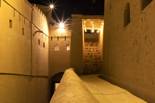 Bahla Fort in Oman with Golden Night Illumination