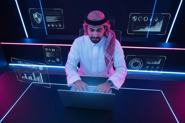 Saudi Man in Futuristic Cybersecurity Control Room