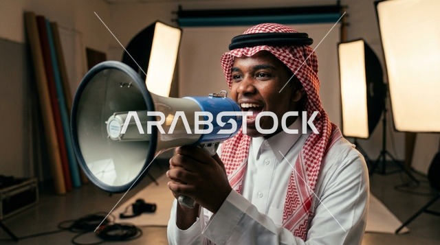 Saudi Man Shouting into Megaphone in Photo Studio