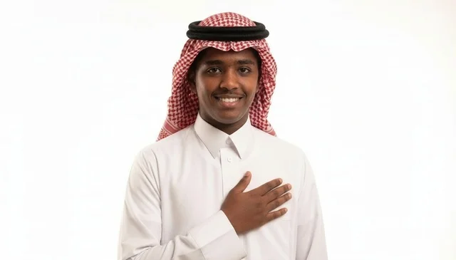 Saudi Man with Hand on Chest in Traditional Dress