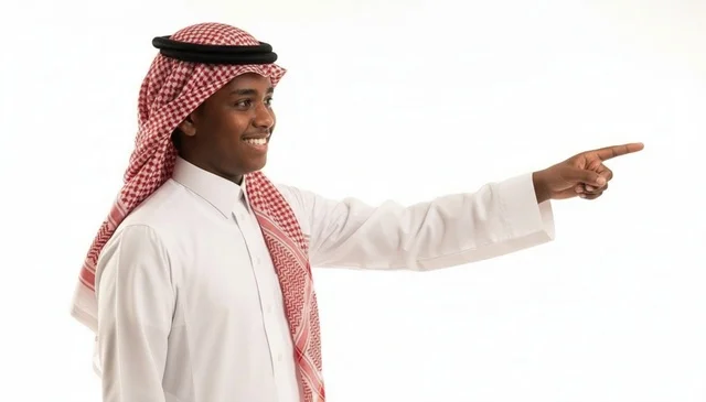 Smiling Saudi Man Pointing Finger on White Background